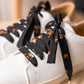 Lacets fleuris noirs et dorés - Lacets originaux chaussures | Mon Lacet Français
